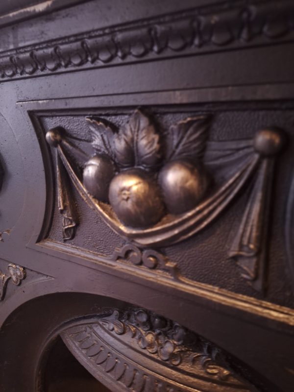detailed carving on vintage fireplace