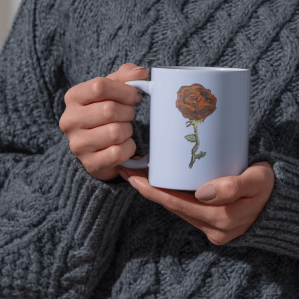 Mug mockup with rose on white